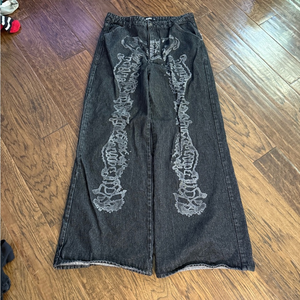 Minga Black Wide-Leg Jeans with Faded Skeleton Print